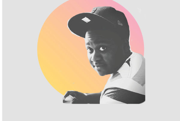 Picture of Ki’tay D. Davidson on a gray background.