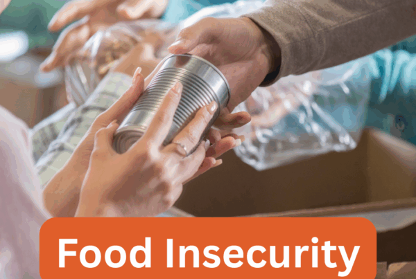 An image of a person handing another a can of food,